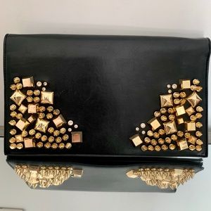 Bebe Black Clutch with Gold Studs